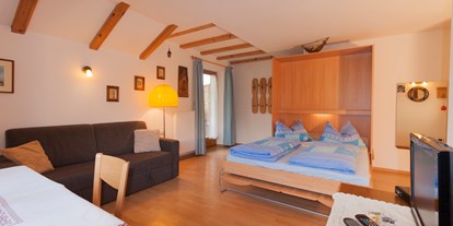 suche - Kategorie Ferienwohnung: 3 Sonnen - Trentino-Südtirol - Wohnung Schlernblick Wohn- und Schlafbereich  - Stinerhof