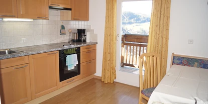suche - WLAN - Italien - Küche Ferienwohnung Tschafon - Grattweberhof