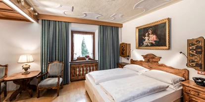 suche - Garage - Hotel Cavallino D'Oro Bed & Breakfast