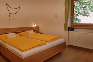 Unterkunft: Apfelgarten Schlafzimmer Nord-Ost - Ferienbauernhof Masunerhof