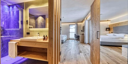 suche - Garage - Zimmer - Brunelle Seiser Alm Lodge