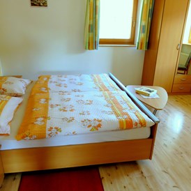 Unterkunft: Schlafzimmer Wohnung "Morgensonne" - Strumpflunerhof