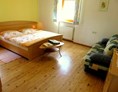 Unterkunft: Schlafzimmer Wohnung "Abendrot" - Strumpflunerhof